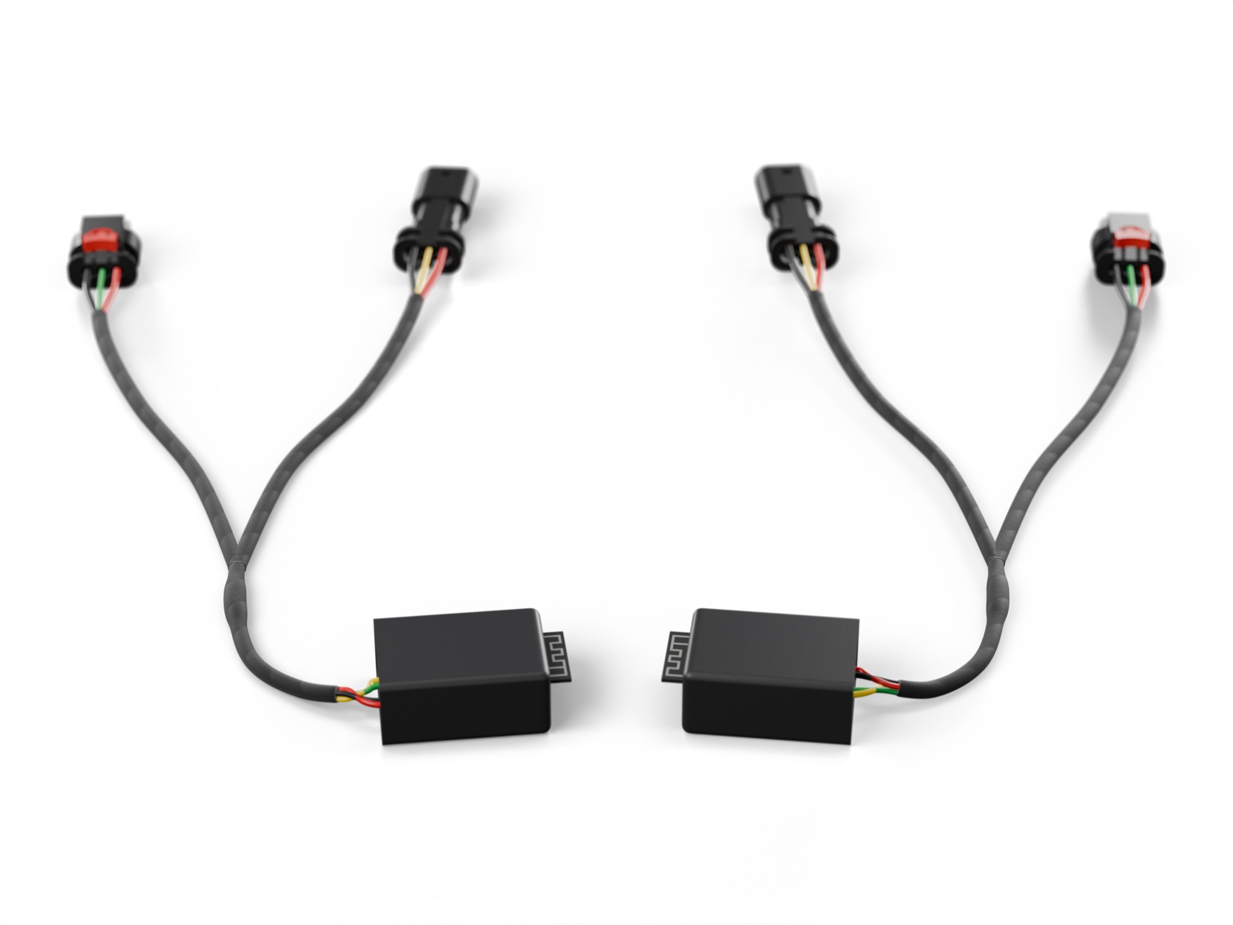 Two TETROFIT headlight modules with their tesa-taped harnesses and Aptiv connectors